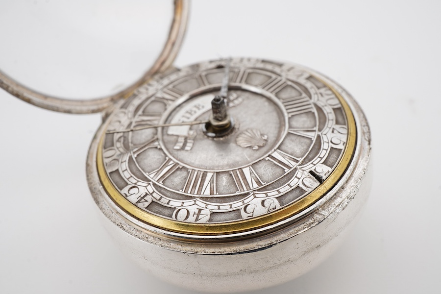A George II silver pair cased keywind verge pocket watch by James Gibb of Stockton, (a.f.), with silvered Roman dial, inscribed Gibb and decorated with a shell, the signed movement unnumbered, inner case diameter 39mm an
